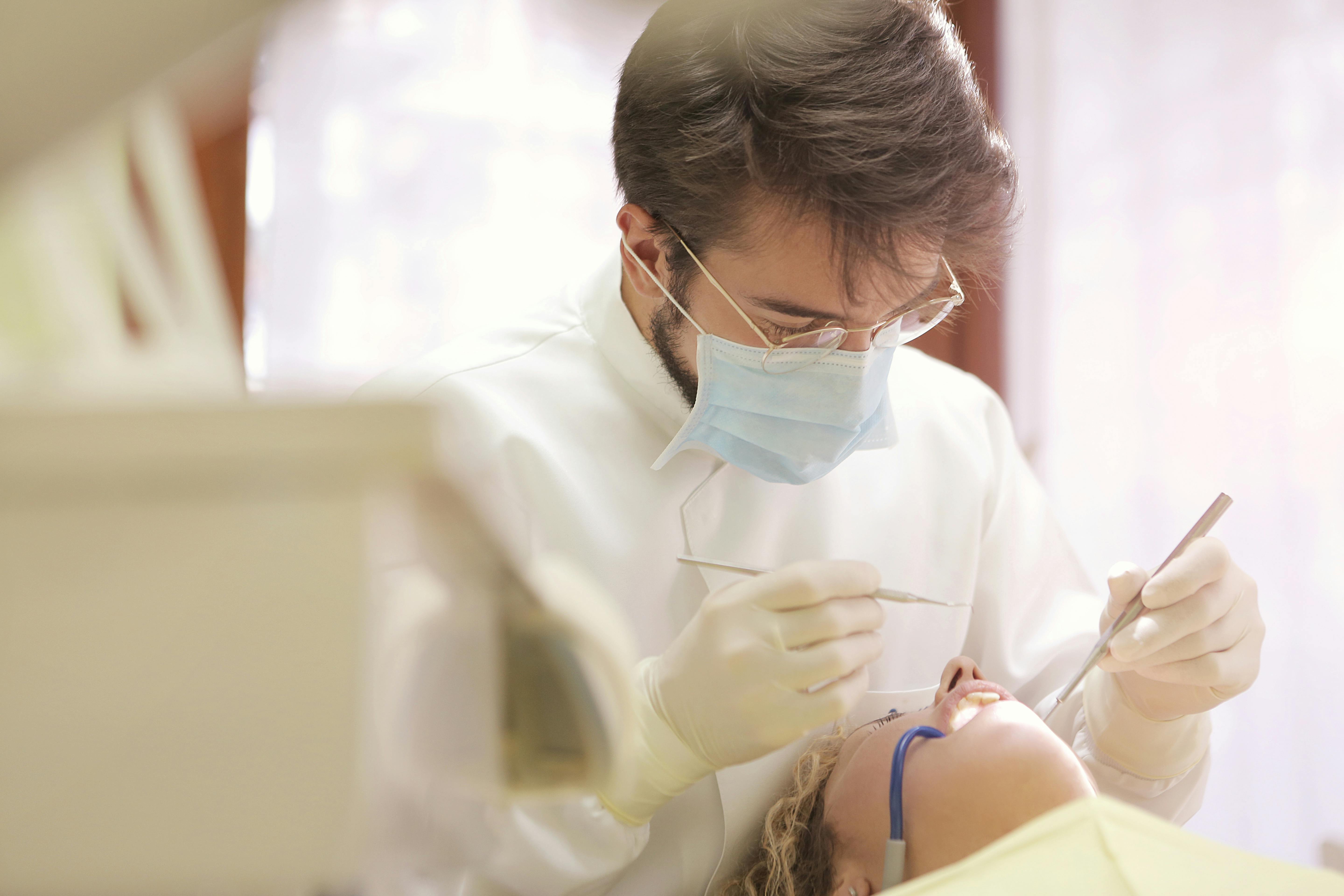 Dental professional providing patient care